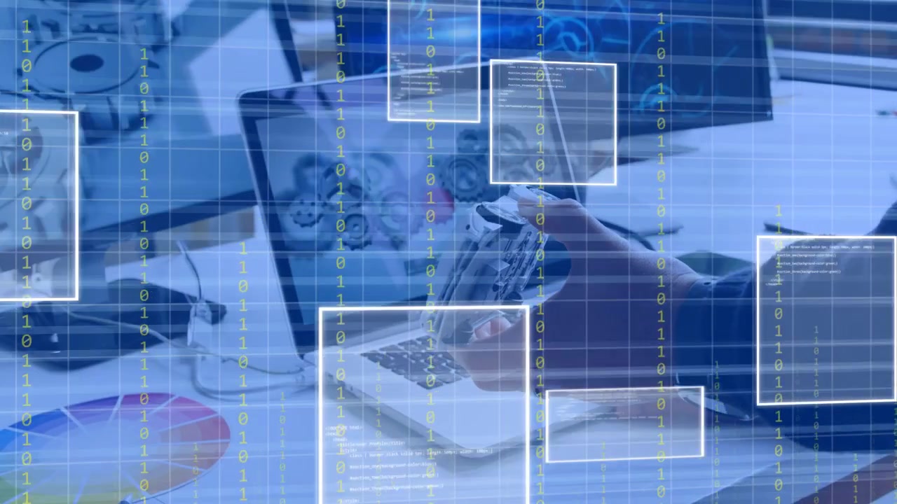 Tech hand rotating gripper over laptop bringing near CAD screen and showing overlays for testing