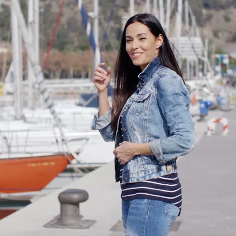 attractive casual young woman standing laughing