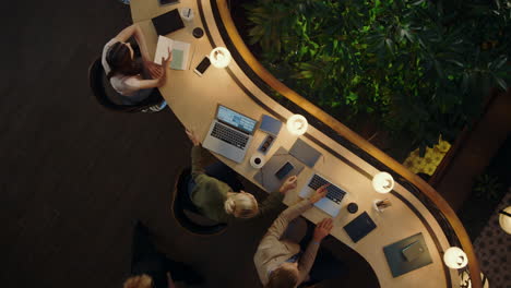 people planning ideas in office. entrepreneurs using devices in creative space