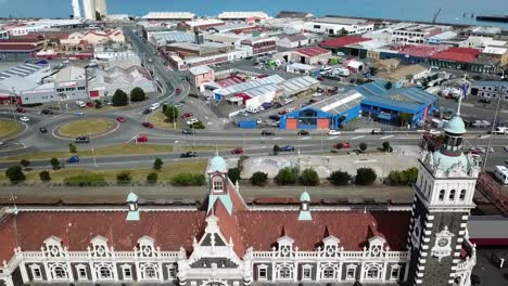 Drone-view-of-the-historic-railway-station-of-Dunedin,-New-Zealand