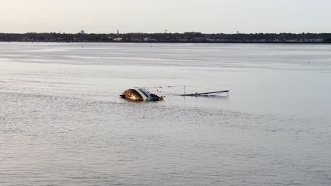 Exploring-the-Sunken-Boat-at-Dublin's-Great-South-Wall-During-An-Evening