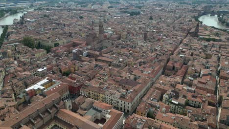 aerial shot of the vintage city with european architecture with a river channel flowing through the city