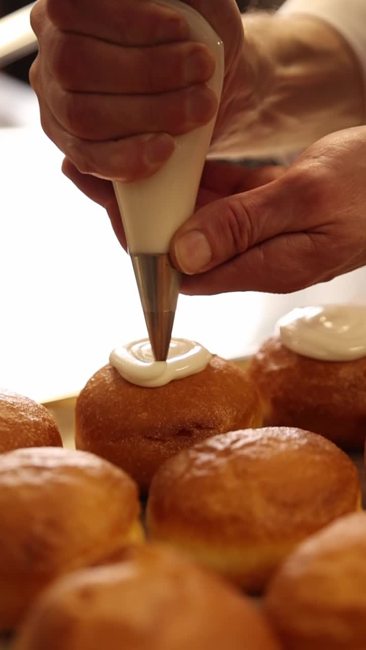 Decorating donuts with icing