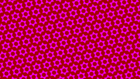 patrón gráfico que cambia rápidamente de color a medida que gira en el sentido de las agujas del reloj y luego en el sentido contrario, creando un efecto hipnótico y estroboscópico.