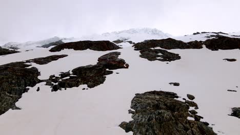aerial take from a mountain in the swiss alps, nearby the diablerets region