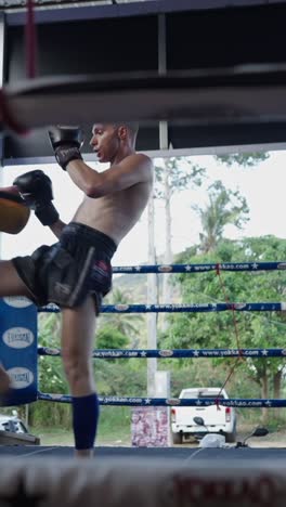 muay thai training in boxing ring
