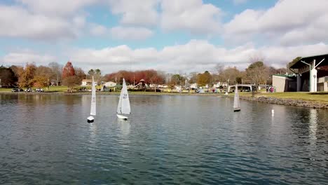 Sail-boat-racing-across-the-lake