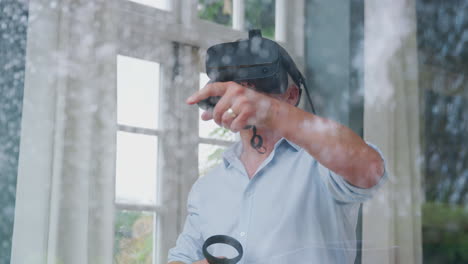 vista a través de la ventana como hombre maduro usa auriculares de realidad virtual y sostiene controladores de juegos