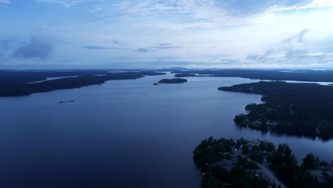 a vast blue lake in the north of quebec, canada