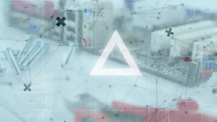 Animation of looping triangles, connected dots, high angle view of electronics on table