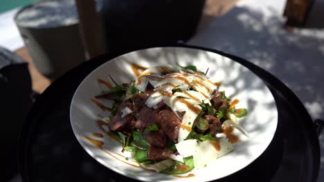 Salad-with-chopped-beef-fillet-and-traditional-Cretan-cheese