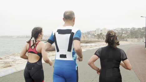 group of triathletes jogging together