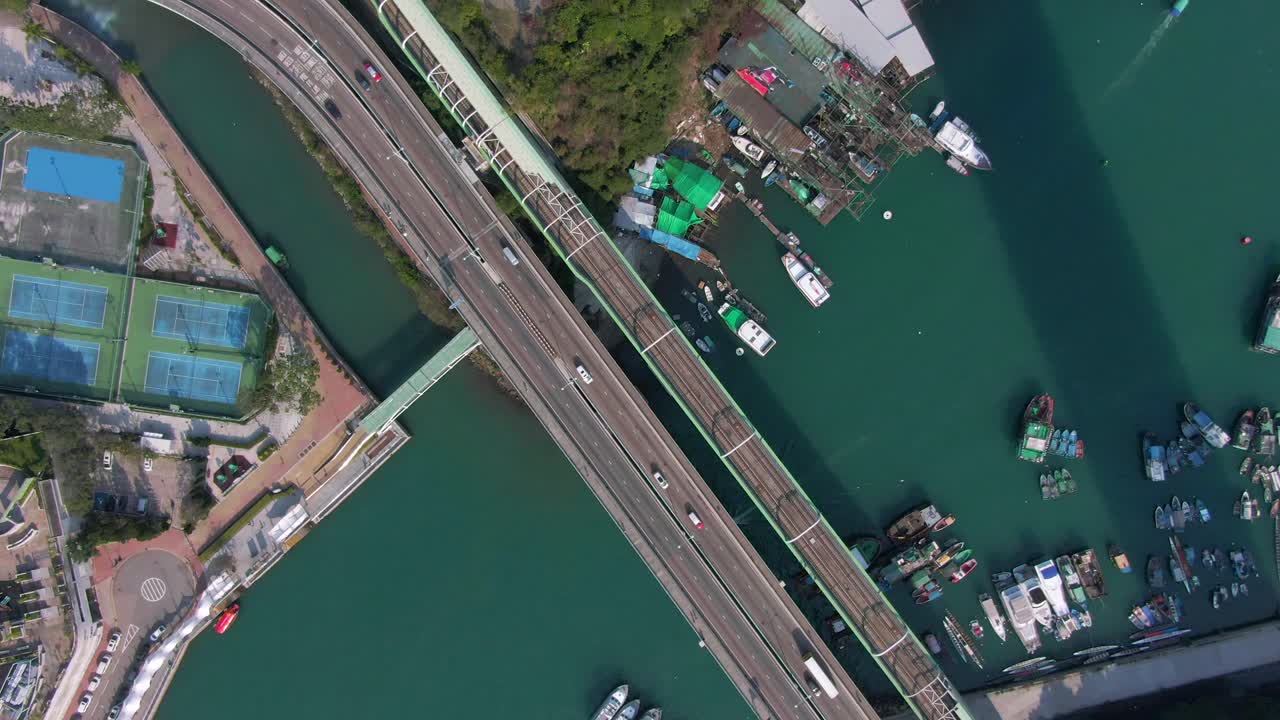 Traffic on Ap Lei Chau highway bridge in downtown Hong Kong, Top down aerial view.