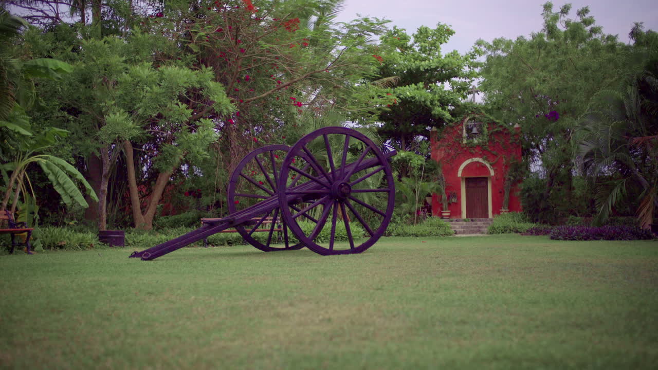 Cannon in front of a chapel