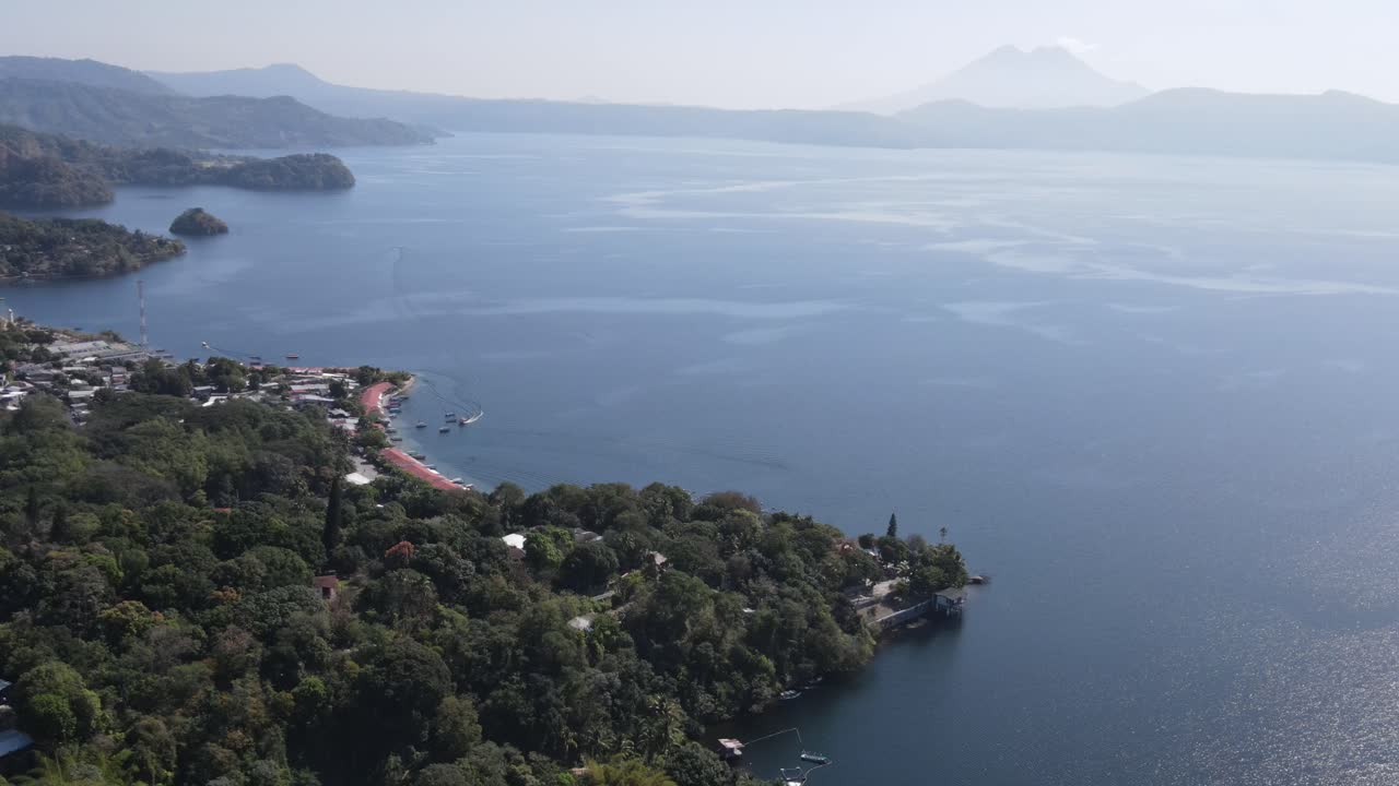 Views of the beautiful Ilopango Lake in El Salvador, with mountains and volcanoes around during the summer