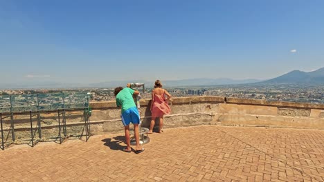 two people enjoy a panoramic view in naples