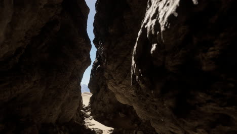 a narrow canyon in the desert