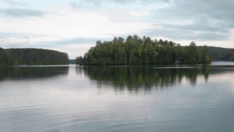 Gorgeous-view-lake-Viceroy-in-Montpellier-Quebec-with-a-treed-island-in-the-distance