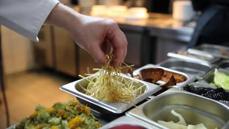 chef preparing food in restaurant kitchen