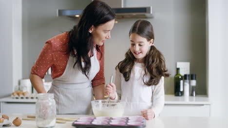 Teaching-her-the-family-recipe