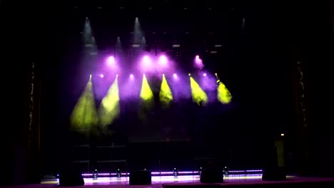 spotlight, a few points of light on stage.