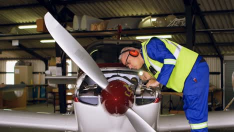 engineer examining aircraft 4k