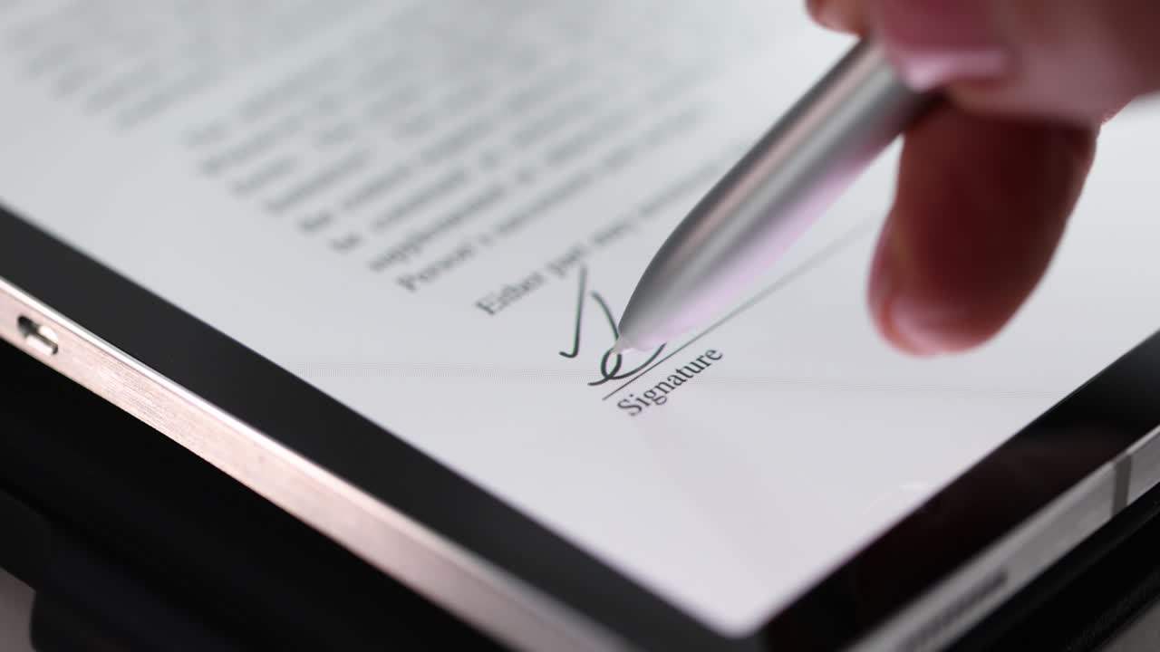 Female hand putting electronic signature on digital tablet closeup 4k movie slow motion