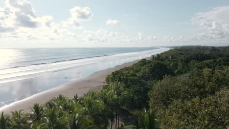 stunning, tropical beach playa linda situated on the beautiful central pacific coast of costa rica wide angle aerial fly over shot