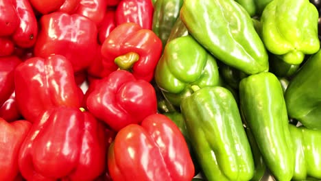 red and green bell peppers on display