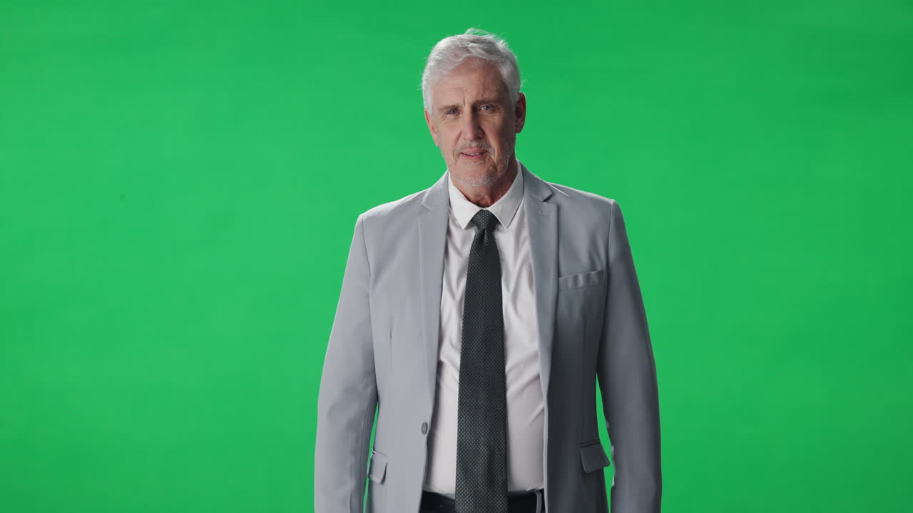 Professional Businessman in Grey Suit on Green Screen