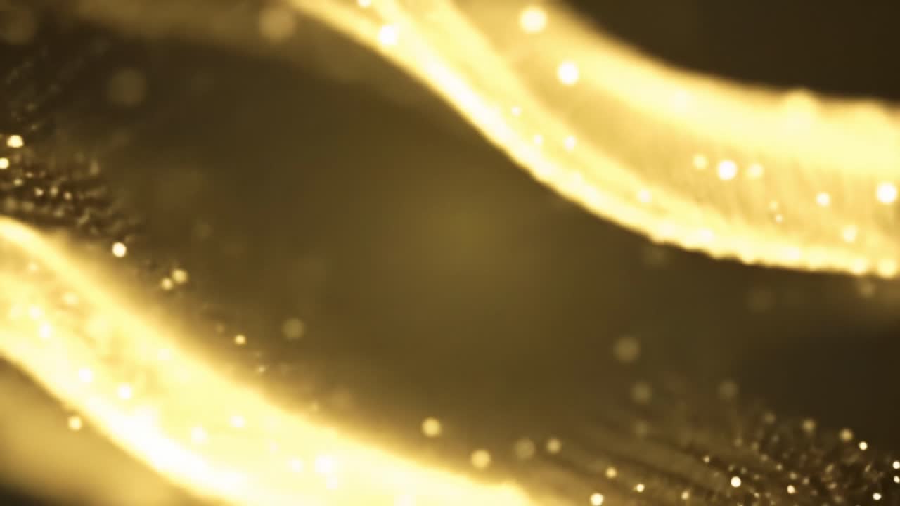 Waves of golden light dance smoothly, creating an enchanting visual ...