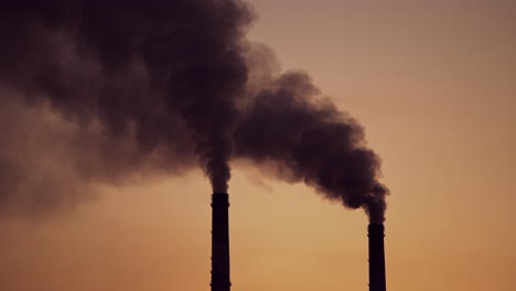 smoking industrial pipes. industrial smoke stack of coal power plant