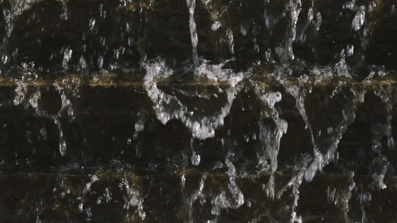 Close-up view from a little waterfall in a leisure park