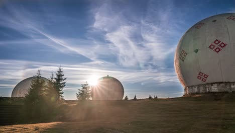 time-lapse with old military station. view on abandoned radar station pamir with spherical roofs. time lapse video with cool clouds and perfect sunset.