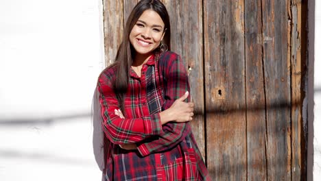 woman in red plaid shirt