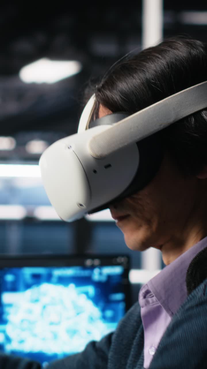 Vertical video Data center engineer using virtual reality, working on neural networks