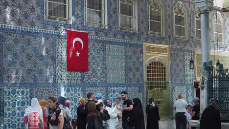 people visiting a beautiful mosque in istanbul