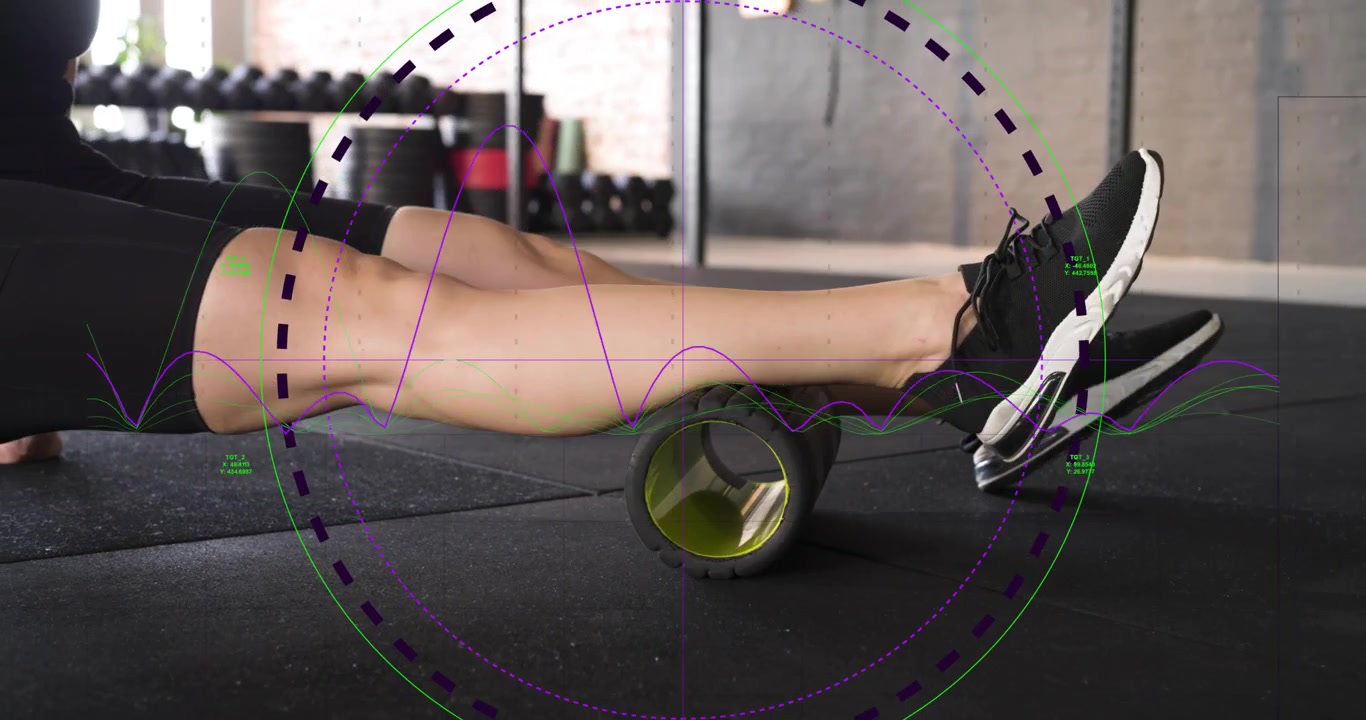 Vertical video: Woman shifting weight, foam-rolling calf to glute in gym, HUD showing release zones