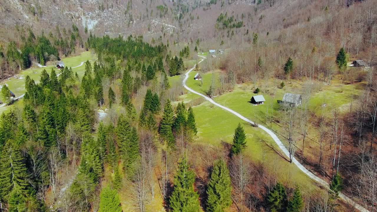 Above the green valley near Bohinj Lake Road to the village in the Julian Alps. Triglav National Park, Slovenia, Europe