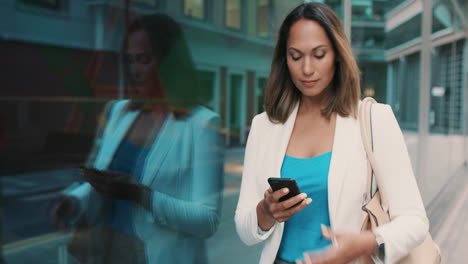 Beautiful-mixed-race-business-woman-walking-through-city