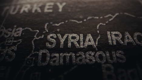 close-up of a world map detailing syria, iraq, and turkey