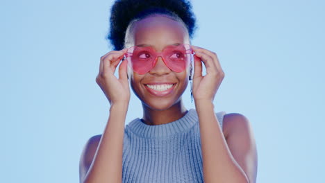 black woman, sunglasses and face in studio