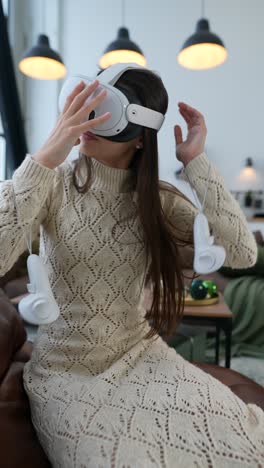 woman experiencing virtual reality in living room