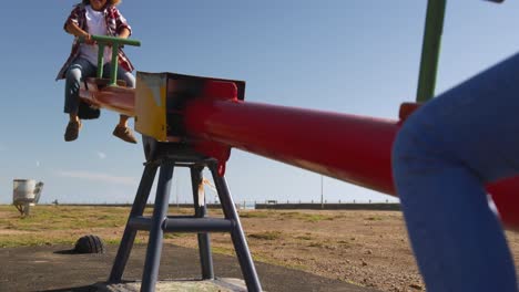 Mother-and-son-having-fun-at-playground