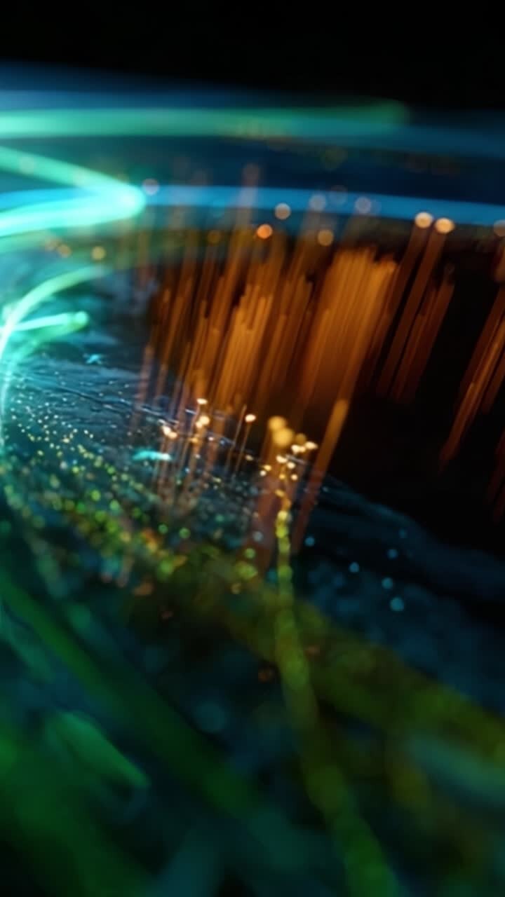 Captivating Visuals of Vibrant Light Trails and Dynamic Data Patterns Creating a Mesmerizing Display of Colors and Textures in a Futuristic High-Tech Setting