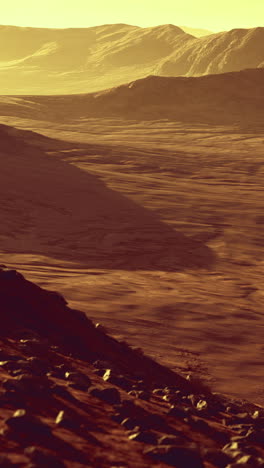 desolate martian landscape under a warm and glowing sky at dusk