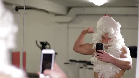 santa claus beats boxing bag angry santa claus santa claus kickboxer training in the gym the concept of sport