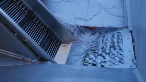 water going through a drain of a boat in slowmotion