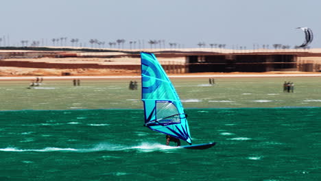 high speed windsurfer, windsurfing in hurghada, egypt, water sport on unpolluted beach, summer day, 60 fps