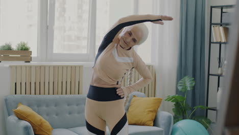 senior woman stretching at home